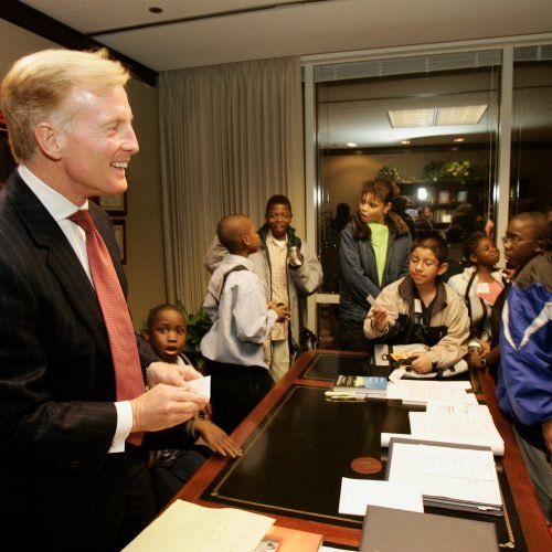 Bill giving FLP students a tour of his office in 2002.